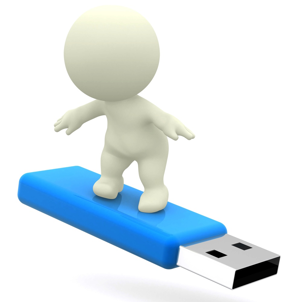 3D guy surfing on a USB - isolated over white.jpeg
